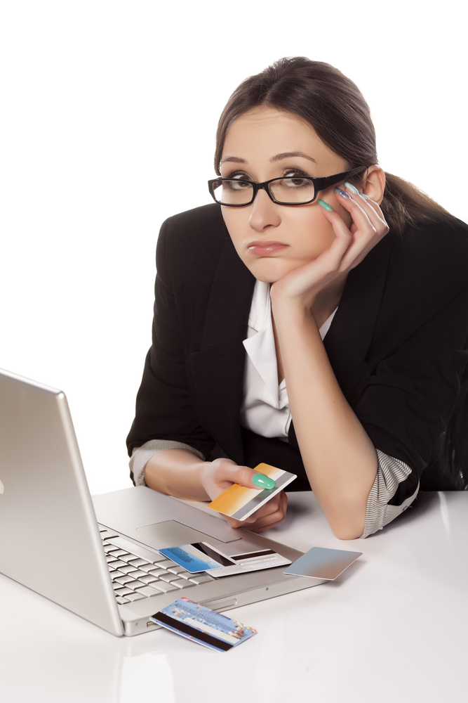 Business woman waorried about credit card debt